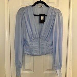 Fashion nova baby blue semi crop top long sleeve. Size Large